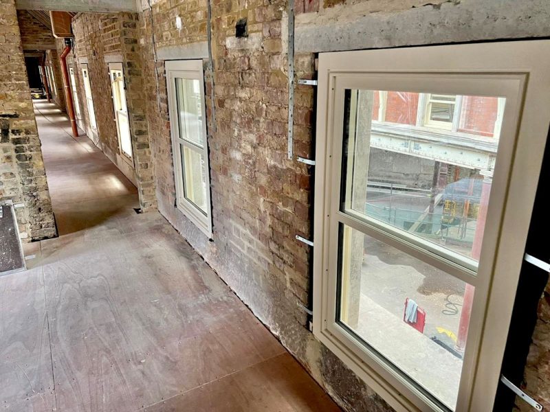 close-up of white frame timber windows installed at Smithfield Market
