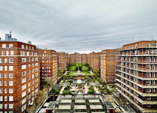 wide view of Dolphin Square, Pimlico with range of timber windows