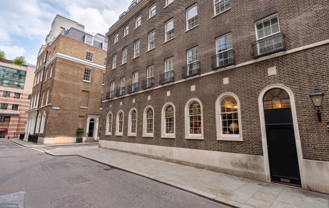 row of timber sash windows installed at 33 old jewry, London