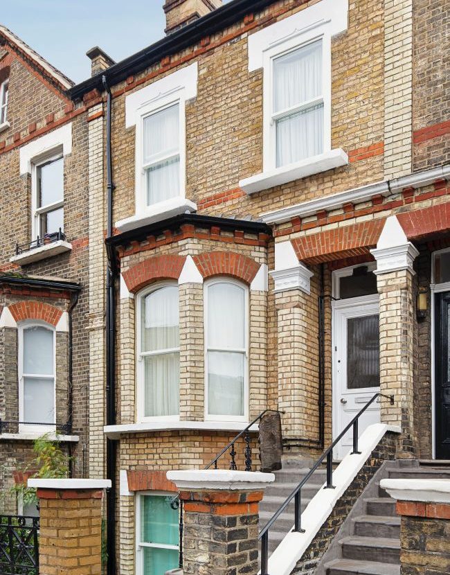 social housing with timber sash and casement windows